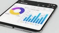 Smartphone displaying financial data with charts and graphs Royalty Free Stock Photo