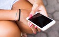 Close-up of smartphones in the woman`s hand