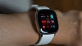 a smartwatch showing heart rate monitoring