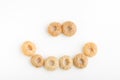 Close-up of a smile of round breakfast cereals.