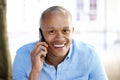 Close up smiling african businessman talking on cellphone Royalty Free Stock Photo