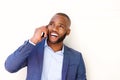 Close up smiling african businessman talking on mobile phone Royalty Free Stock Photo