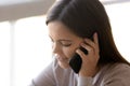 Close up smiling attractive woman talking on phone, pleasant conversation Royalty Free Stock Photo