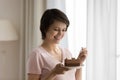 Close up smiling beautiful woman eating cake, enjoying dessert Royalty Free Stock Photo