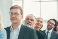 Close up. smiling business people standing in a row. Royalty Free Stock Photo