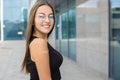 Close-up of a smiling European woman in casual clothes after a vaccination with a band-aid glued to her arm Royalty Free Stock Photo