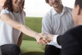 Close up smiling hr manager shaking hand of applicant on job interview Royalty Free Stock Photo
