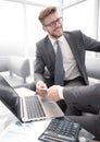 Close up. smiling lawyer gives his business card to businessman