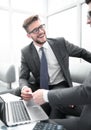 Close up. smiling lawyer gives his business card to businessman