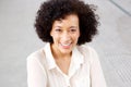 Close up smiling middle age woman with curly hair