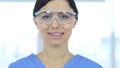 Close Up of Smiling Scientist, Doctor in Protective Glasses Royalty Free Stock Photo