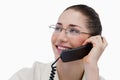 Close up of a smiling secretary making a phone call Royalty Free Stock Photo