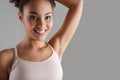 Happy girl demonstrating hairless underarm Royalty Free Stock Photo