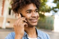 Close up of smiling young african man outdoors Royalty Free Stock Photo