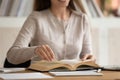 Close up of girl student reading book studying at home Royalty Free Stock Photo