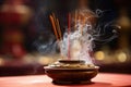 close-up of smoke rising from burning incense