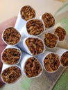 Close up of a smoking cigarettes . cigarette filter tubes