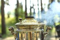 Close up of smoking russian samovar