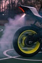 Close Up of smoking tire from motorcycle burnout Royalty Free Stock Photo