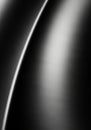 A close-up of a smooth, curved metallic surface with a brushed texture. The lighting Royalty Free Stock Photo