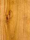 Close up of smooth wood surface with natural knot pattern Royalty Free Stock Photo
