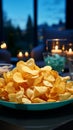 Close up of snack chips on a coffee table, within a serene, blue toned living space