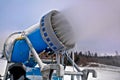 Close up snow cannon making snowflakes Royalty Free Stock Photo