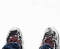 Close-up of  snow-covered boots  durring  winter Royalty Free Stock Photo