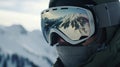 Close-up of a snowboarder wearing a helmet and goggles