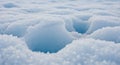 A close-up of a snowy surface with formations and hollows. The Royalty Free Stock Photo
