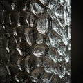 Close-up of soap bubbles forming a honeycomb-like pattern. The bubbles are Royalty Free Stock Photo