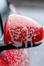 Close-up of soapy car mirror during wash process Royalty Free Stock Photo