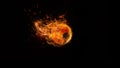 Close-up soccer ball in fire on dark background Royalty Free Stock Photo