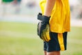 Close up of Soccer Gloves of Young Boy Soccer Goalie Standing in a Goal Royalty Free Stock Photo