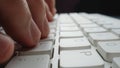 Close-up soft-focus finger typing on keyboard Royalty Free Stock Photo