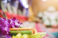 Close up and soft focus of Pink flower candle with blurred background and copy space for text at Thailand temple ordination buddhi Royalty Free Stock Photo