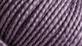 Close up of soft purple yarn texture for knitting and crafting projects Royalty Free Stock Photo