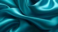 Close up of a soft Satin Texture in teal Colors. Elegant Background.