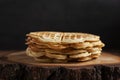 Close-up of soft Viennese waffles on a wooden saw