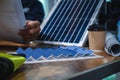 Close-up Solar Farm Sample Model on Desks While Meeting and Discussions