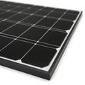 Close-up of a solar panel consisting of black photovoltaic cells arranged in a grid Royalty Free Stock Photo