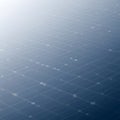 Close-up of a solar panel featuring a dark blue surface with a grid pattern of white lines and scattered light gray spots. Royalty Free Stock Photo