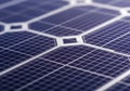 Close-up of a solar panel with a grid-like pattern of dark blue Royalty Free Stock Photo