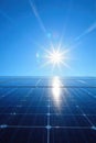 Close up of solar panel reflecting a clear blue sky and sun, highlighting advanced technology. A macro shot focusing on the Royalty Free Stock Photo