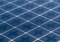 Close-up of a solar panel showcasing its intricate grid pattern. The Royalty Free Stock Photo