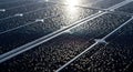 Close-up of Solar Panel Surface with Water Droplets and Sunlight Reflection Royalty Free Stock Photo