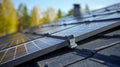 Close-up of solar panels installed on a rooftop under sunlight. Royalty Free Stock Photo