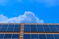 Close-up solar panels mounted on the roof on modern building for receive energy from sunlight for converted to electrical energy Royalty Free Stock Photo