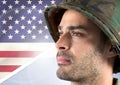 Close-up of a soldier looking horizon against american flag background Royalty Free Stock Photo