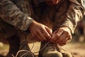 Close-up of soldier tying shoelaces in boot camp. A close-up of a soldier tying his boot laces, AI Generated Royalty Free Stock Photo